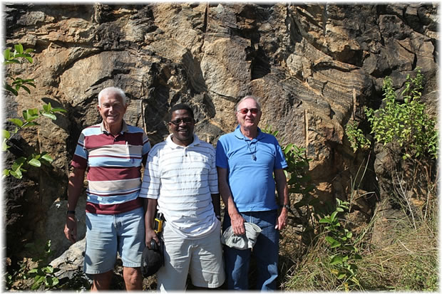 Kent and colleagues view old rocks in Africa